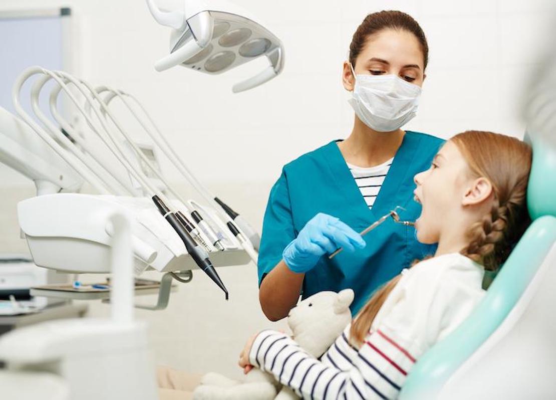 Dentist with patient