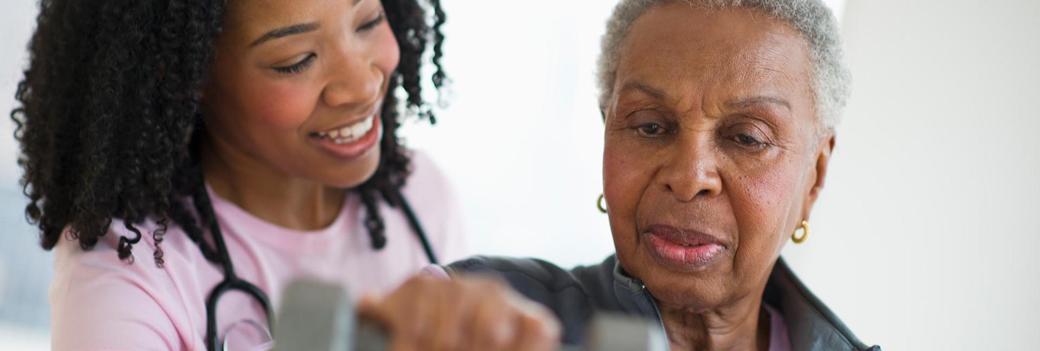 Occupational therapist with patient